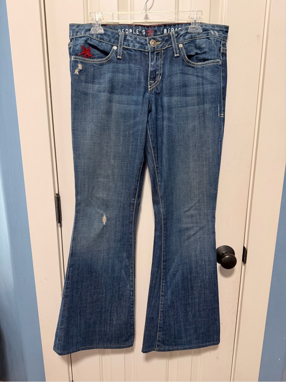 People’s Liberation Women’s Blue Flared Jeans